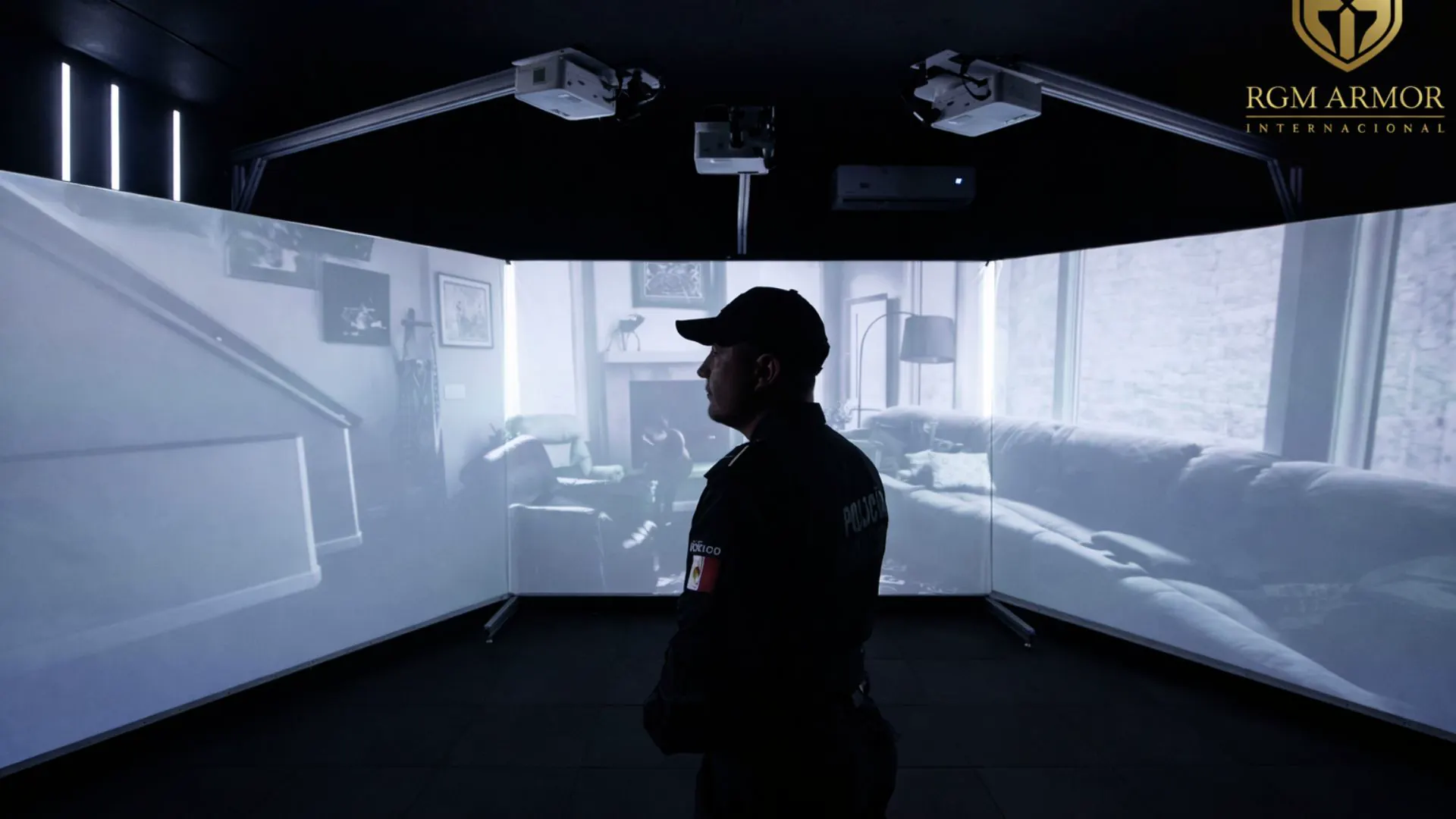 Police officer in front of three projection screens showing an indoor scenario in an RGM virtual shooting range